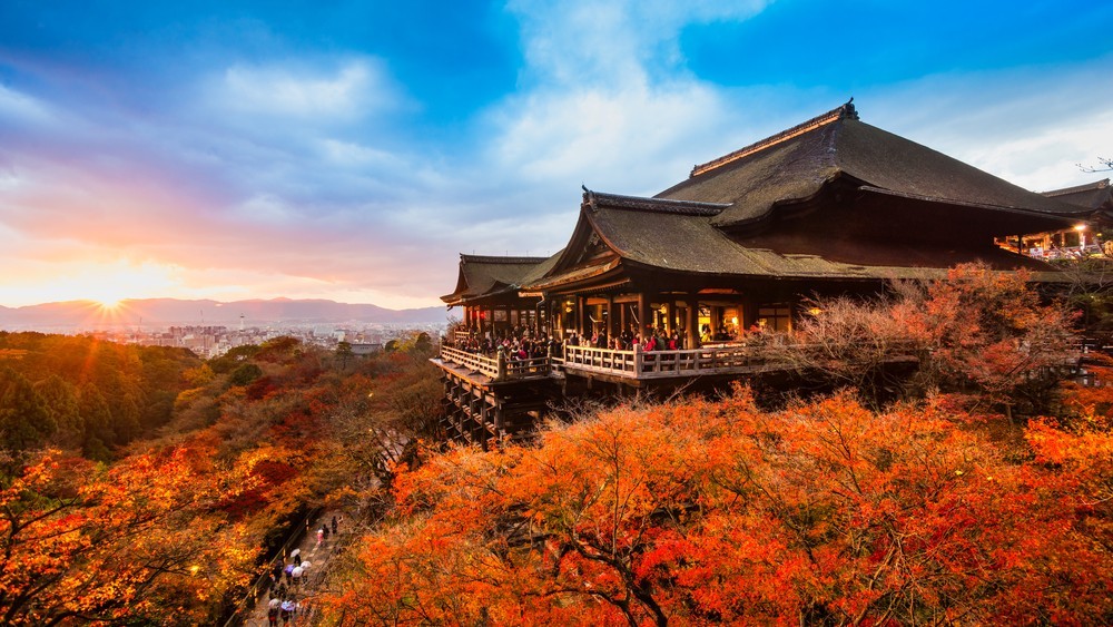 Kiyomizu-dera Temple overlooking Kyoto at sunset in autumn.