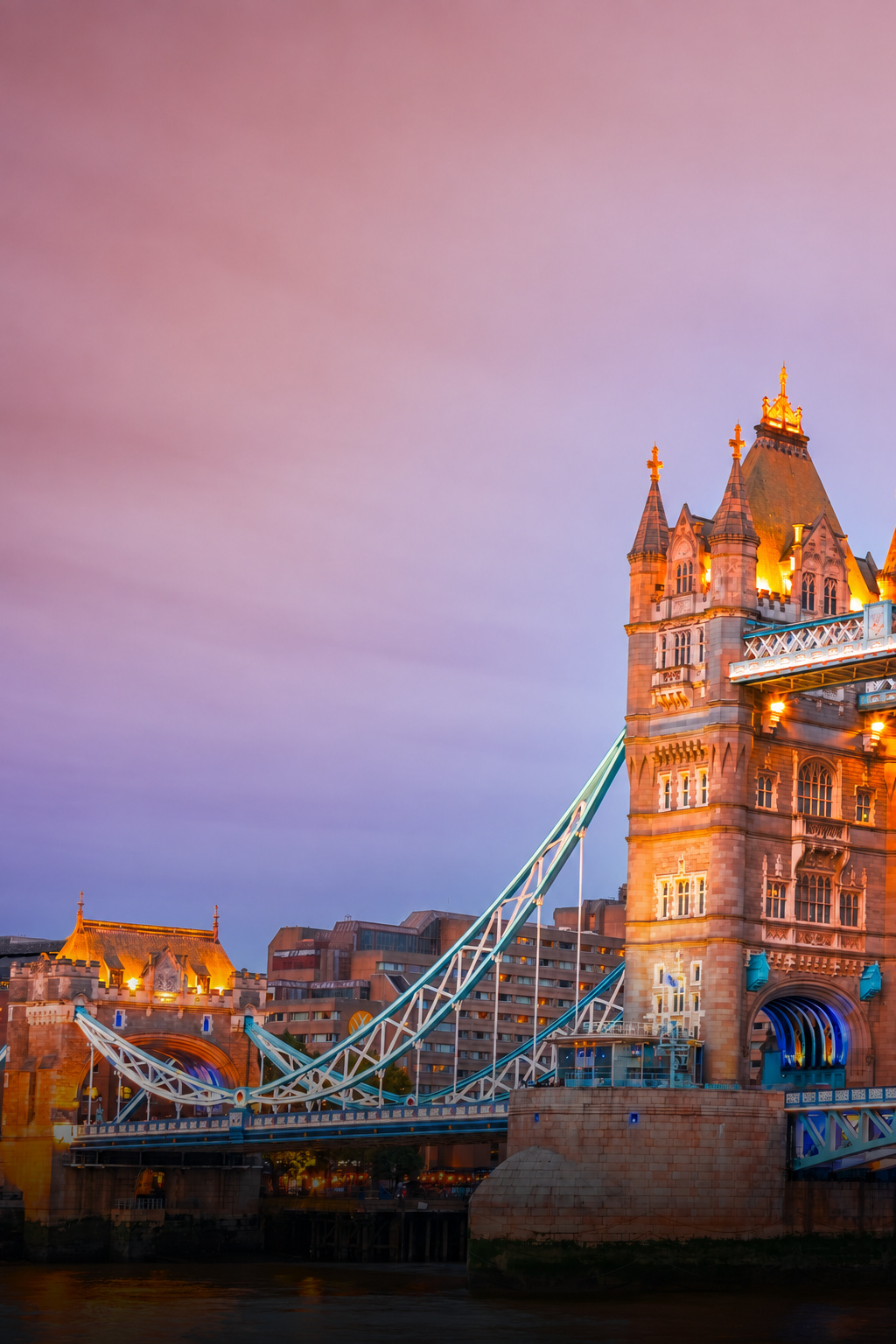 Tower Bridge illuminated at dusk in London