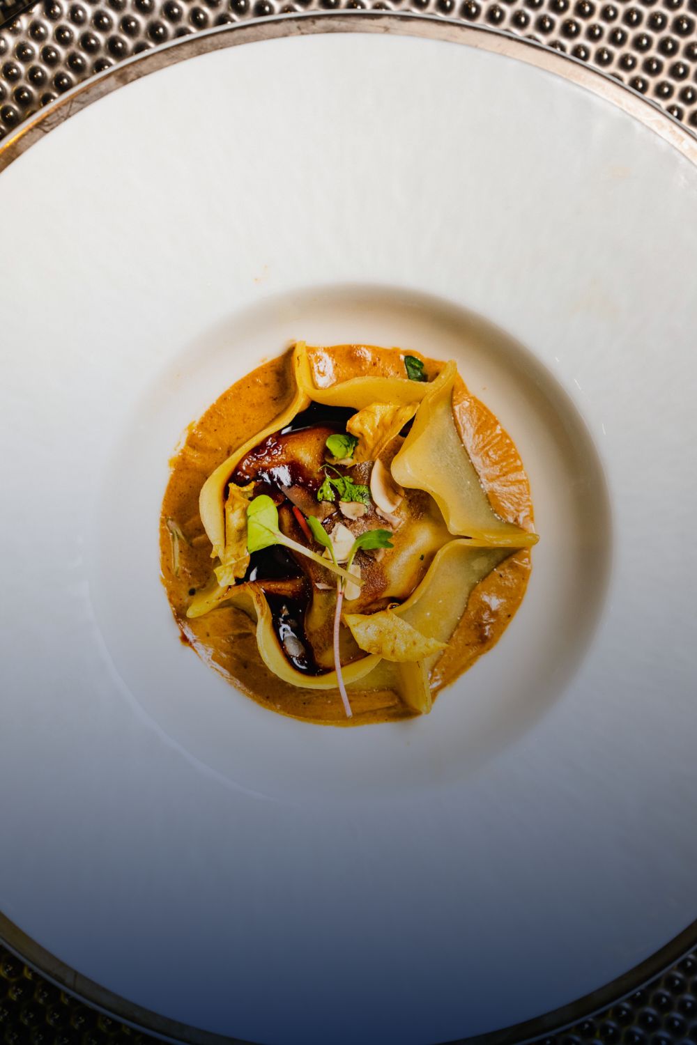 white dinner plate with meal