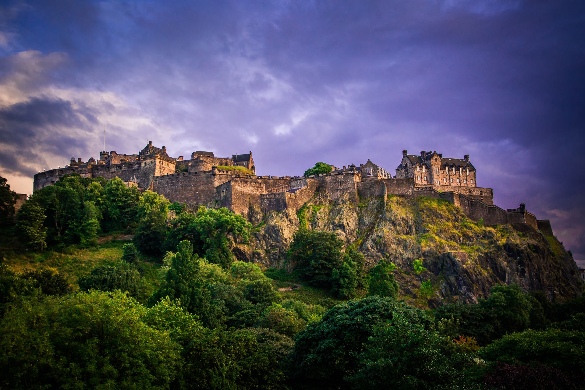 mountain top castle at dusk