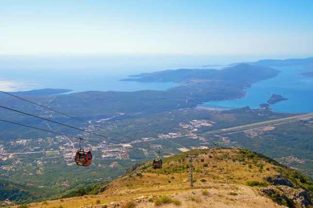 Cable cars above Montenegro’s mountainous coastline