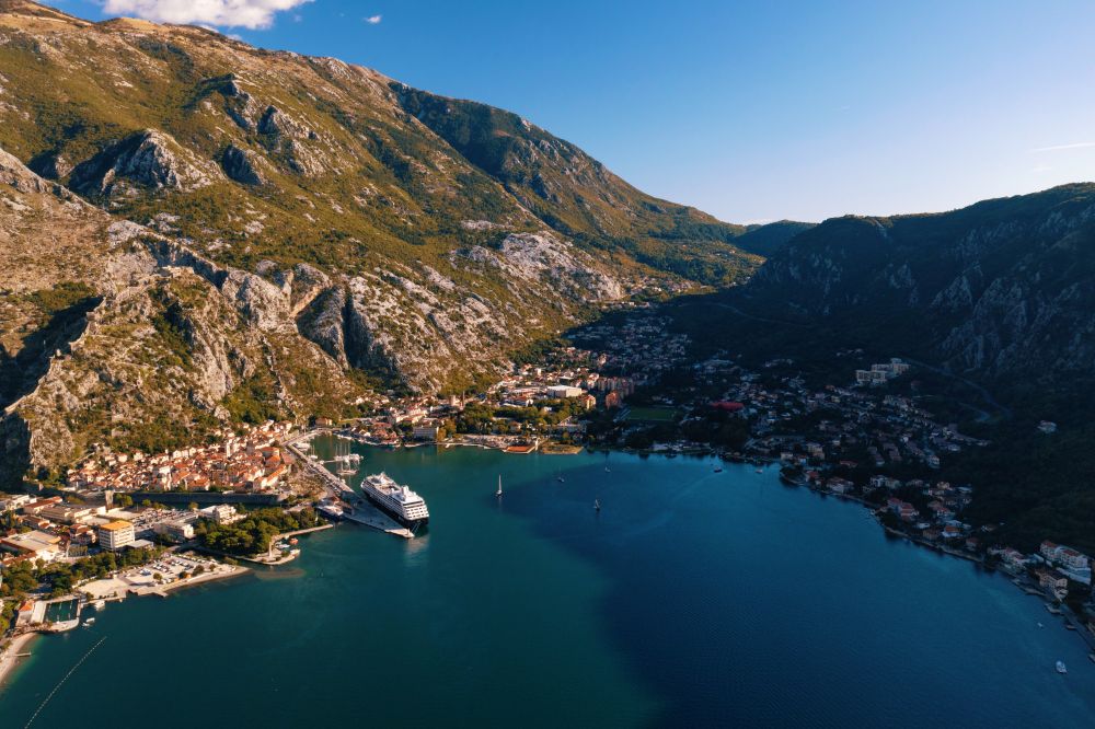 Aerial view of Kotor and a cruise ship in the bay