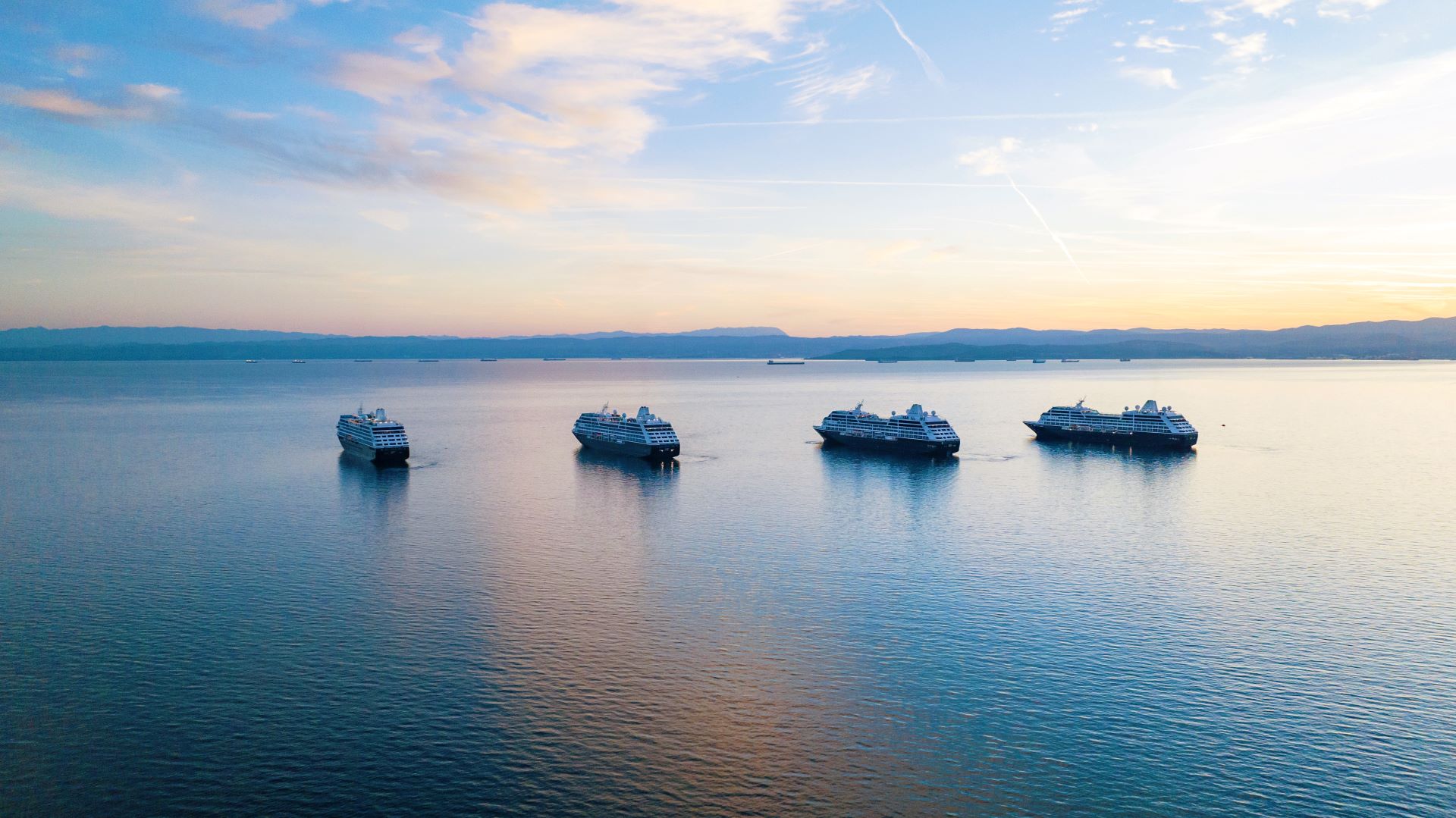 ships at sunrise in ocean