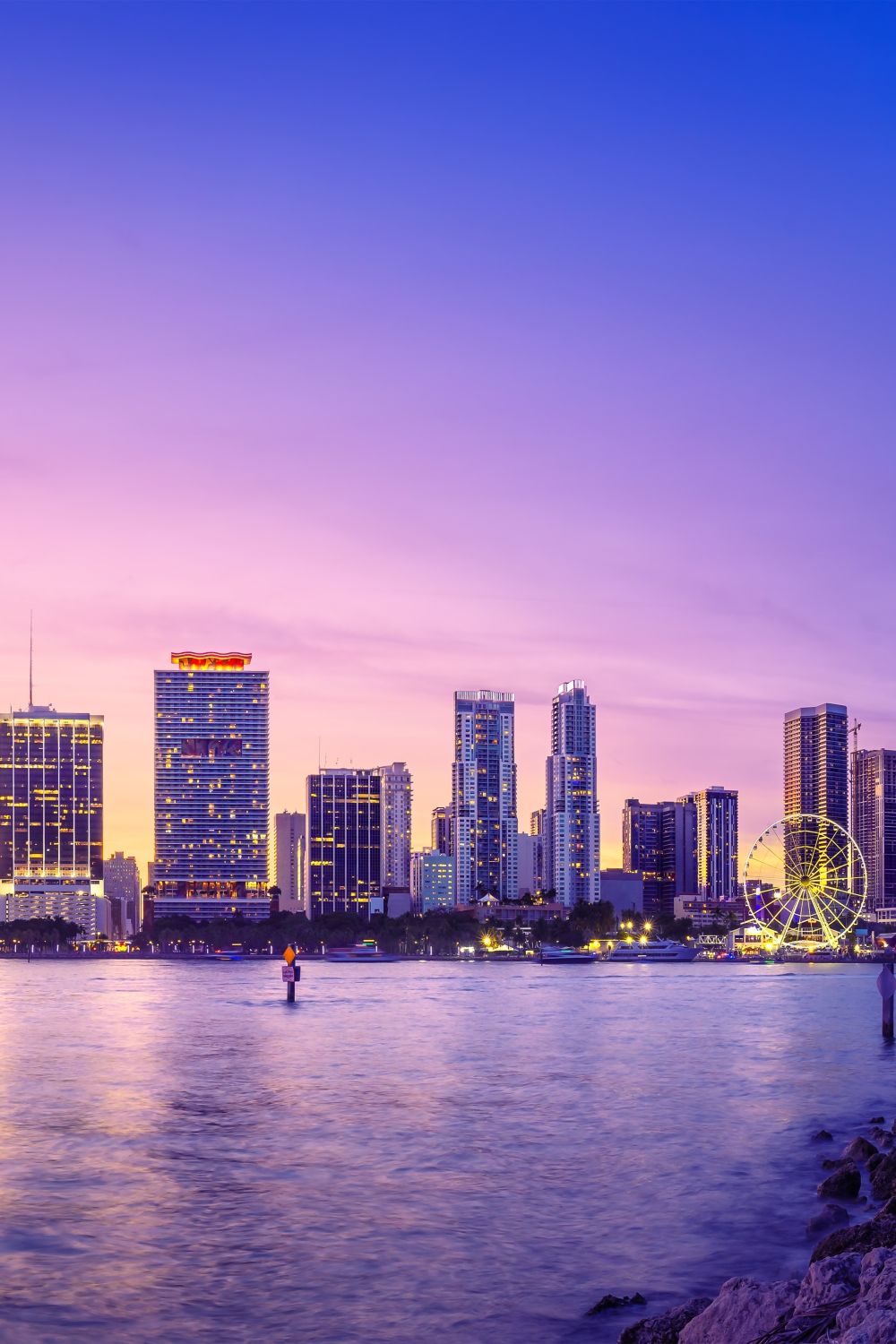 Miami skyline across Biscayne Bay at sunset