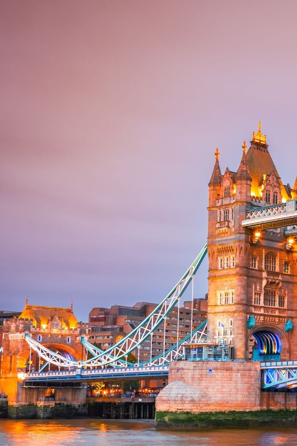 Tower Bridge illuminated at dusk in London