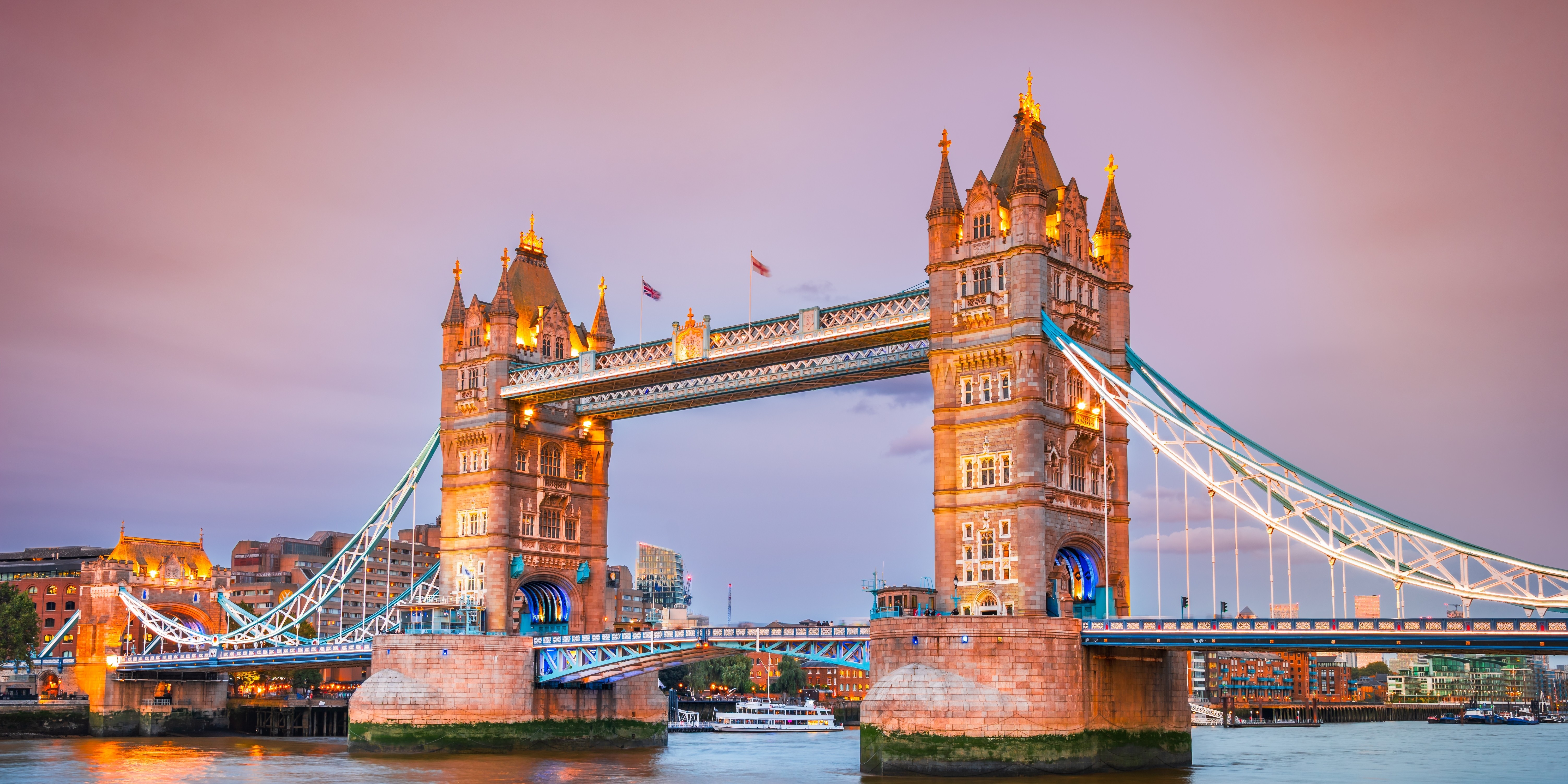 Tower Bridge illuminated at dusk in London
