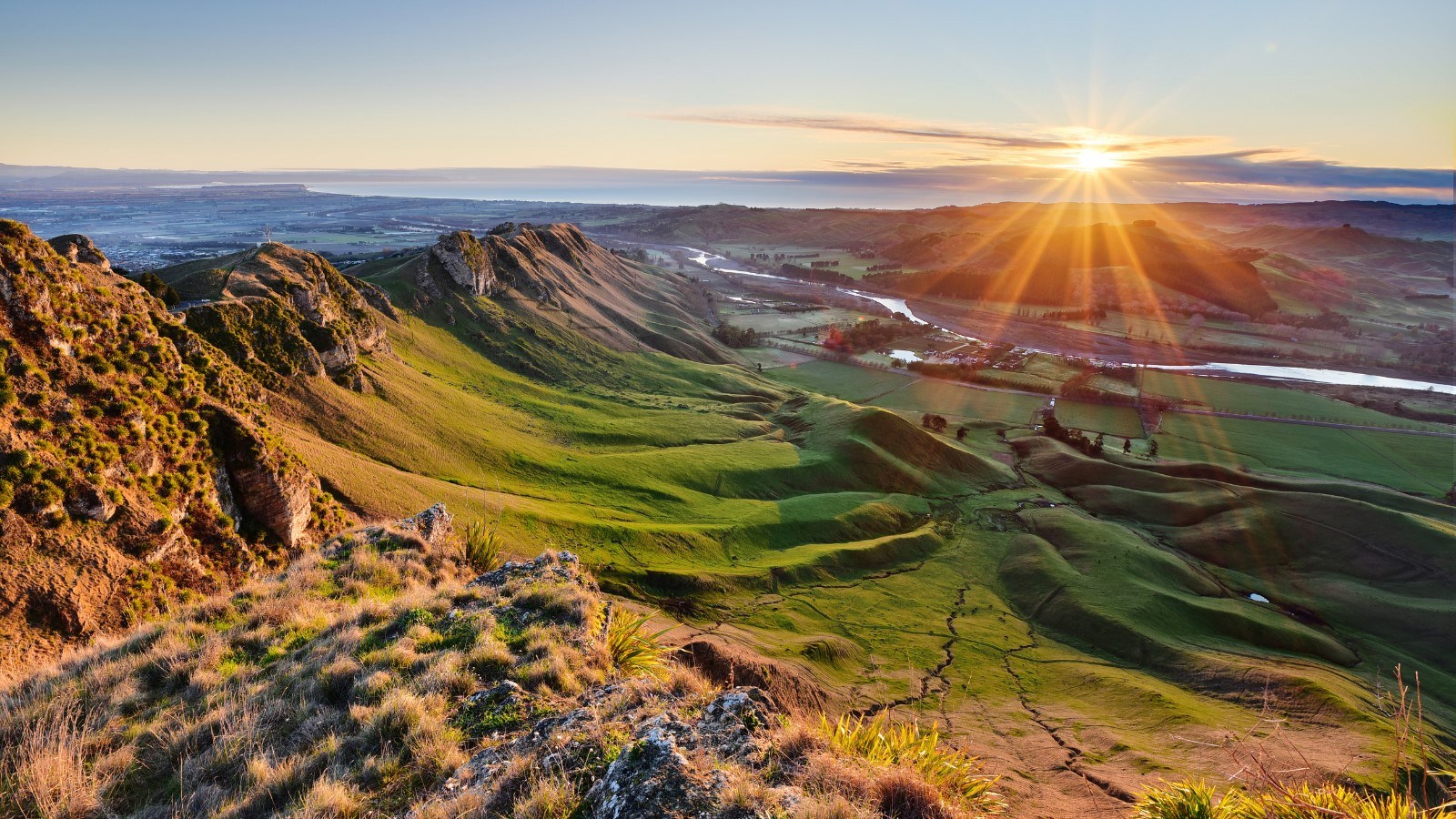 sunset view from mountaintop overlooking the valley