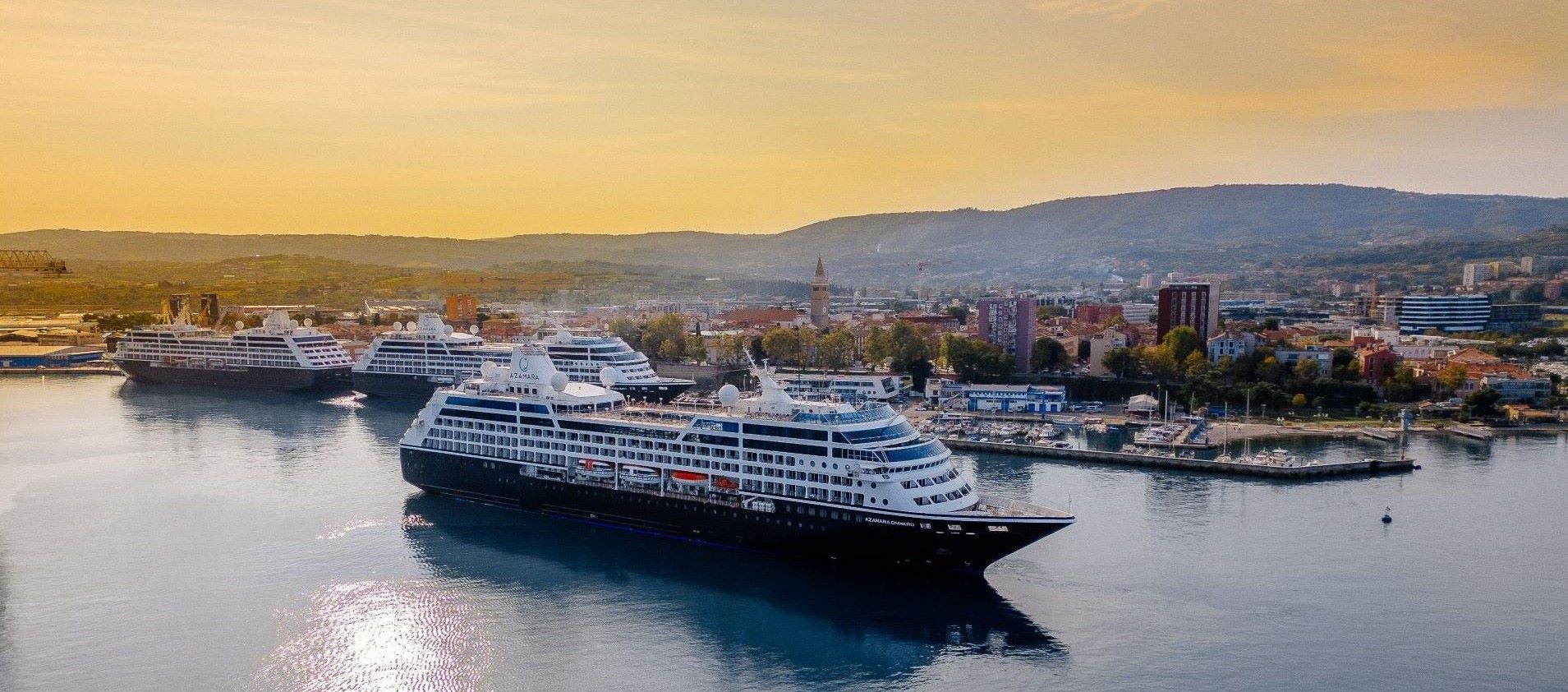 sister cruise ships in harbor