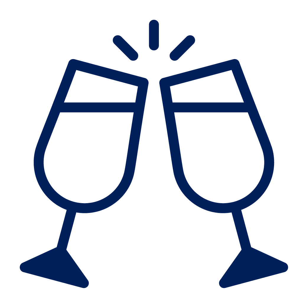 Two glasses clinking at a party