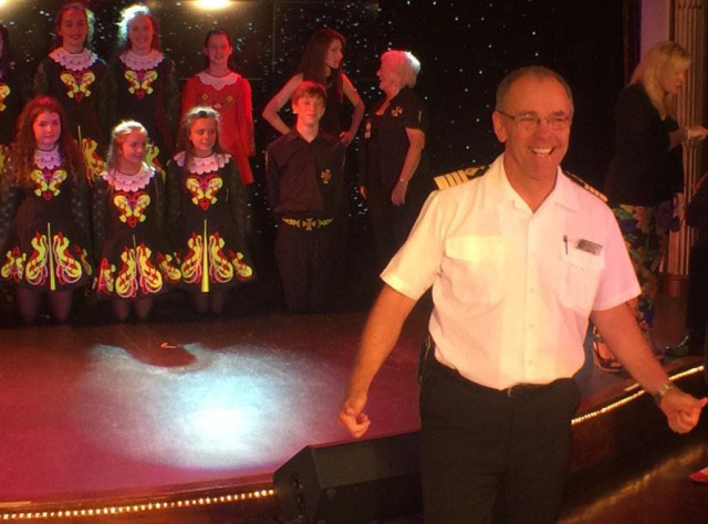 Azamara's Captain Jose enjoying an onboard performance.