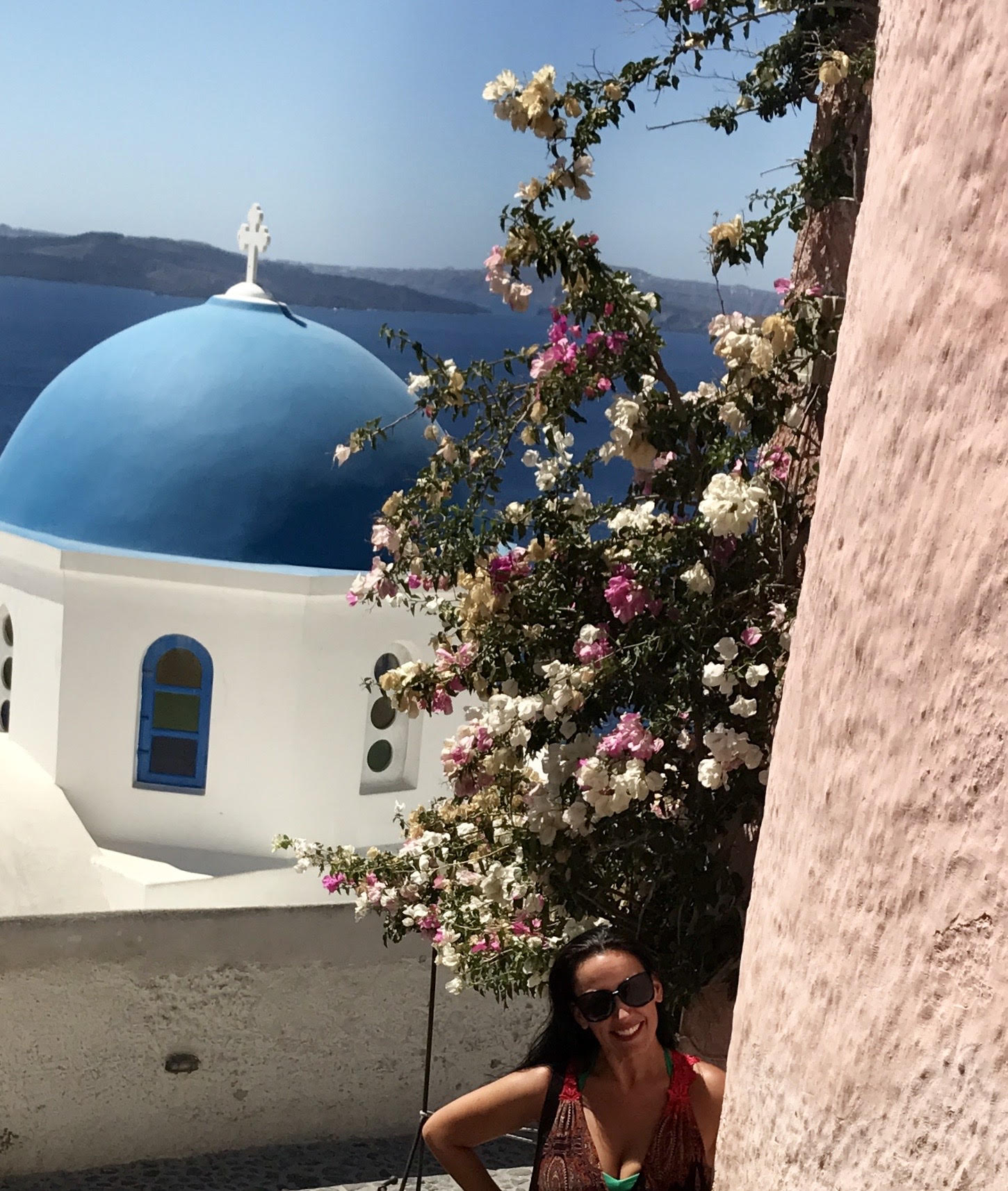 Amanda Poulson poses in Santorini
