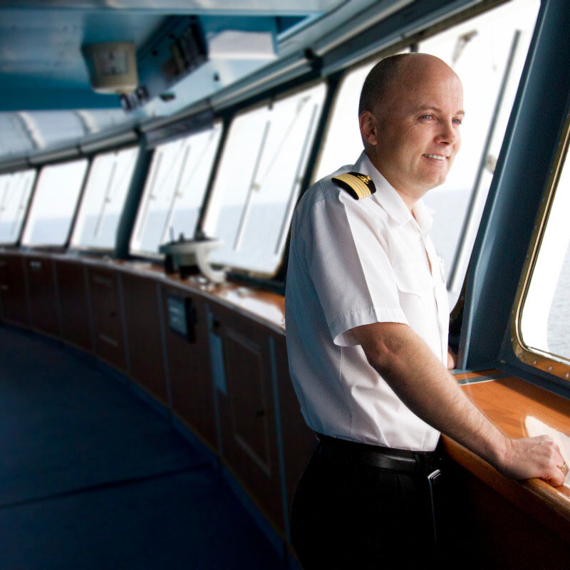 Captain Johannes looks out the window