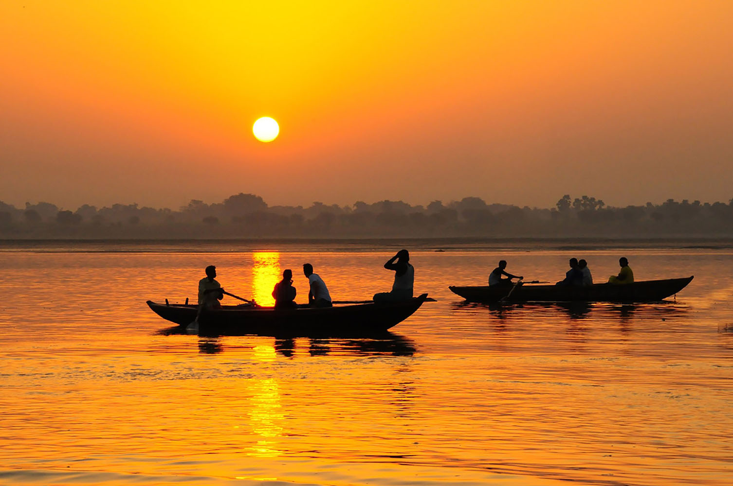 Boat on the sea with a sunset