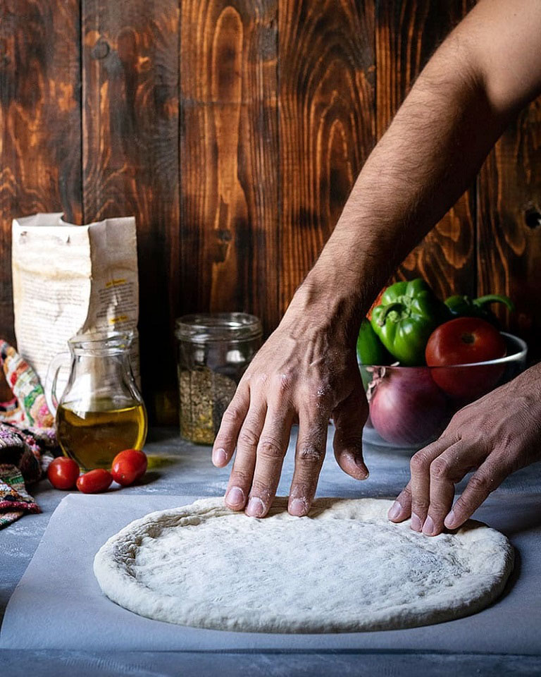 Blog - Making Greek Pizza - The Hungry Bites