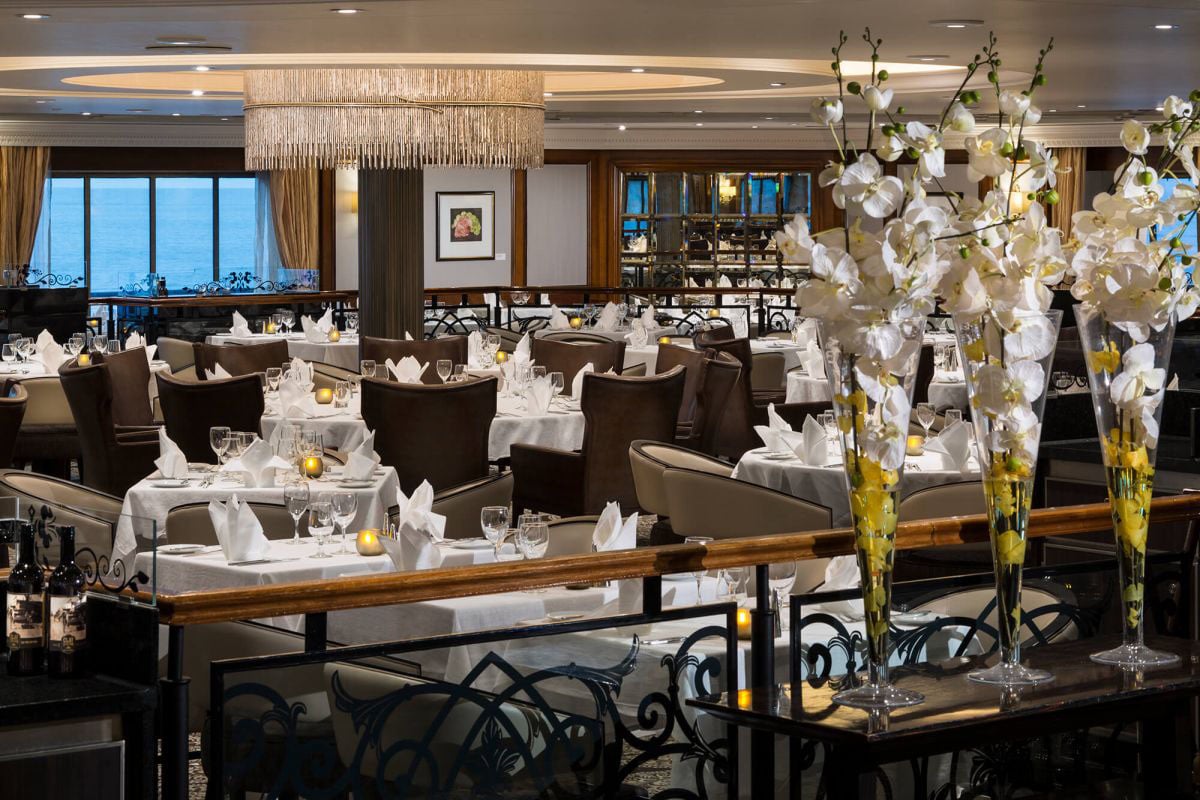 Elegantly set dinner tables for the Windows Cafe buffet