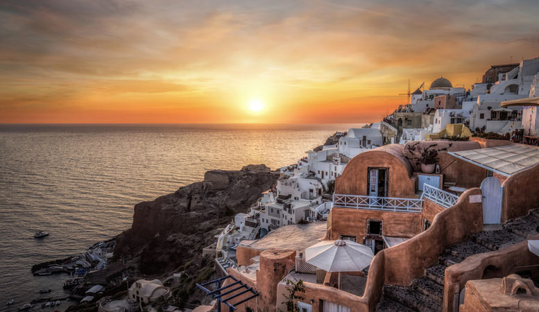 An coastal town in Greece at sunset