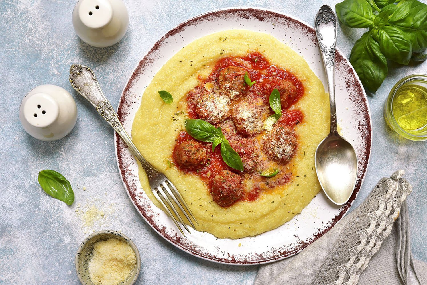Polenta with meatballs in tomato sauce
