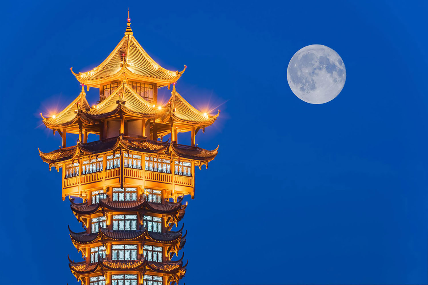 Chinese traditional tower illuminated at night