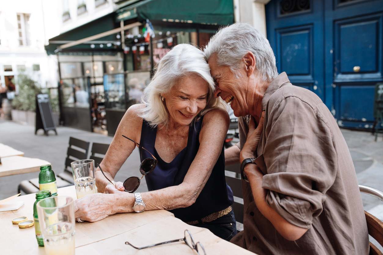 Couple chatting to each other and smiling