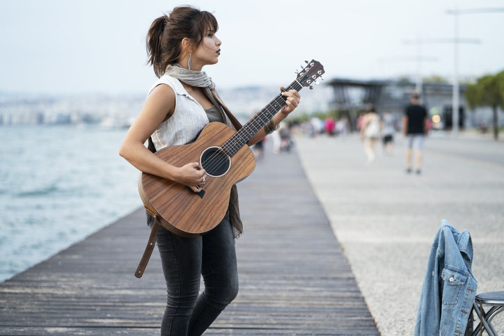 A street musician performs in Greece