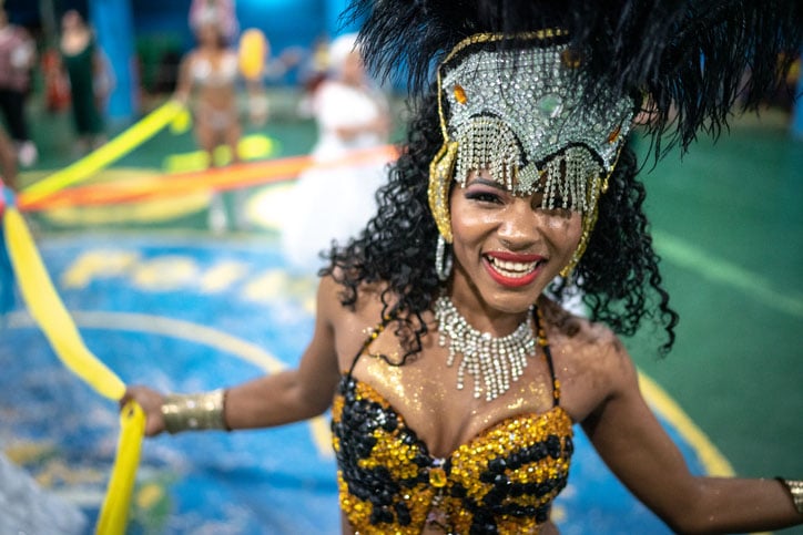 A woman celebrating and dancing at Brazilian carnival