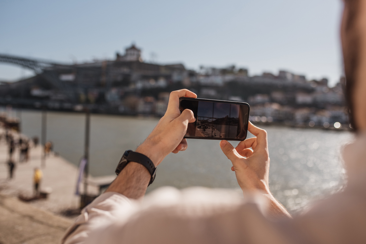 Man taking a picture with a smartphone