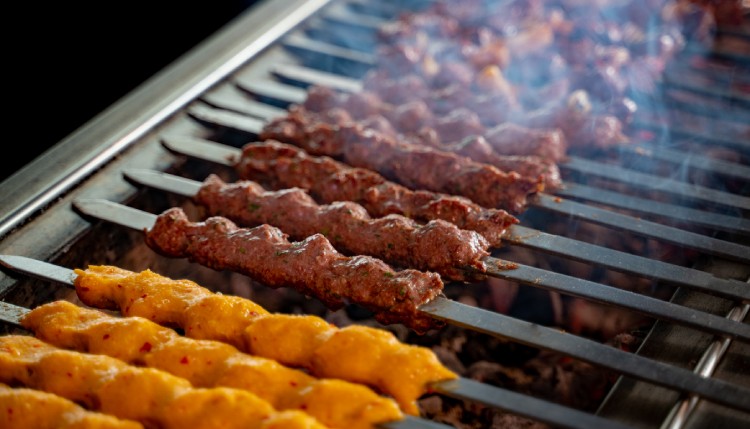 tikka, shish & kofta kebabs on charcoal barbecue
