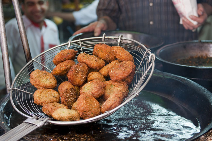 Falafel lifted out of hot oil in Cairo, Egypt