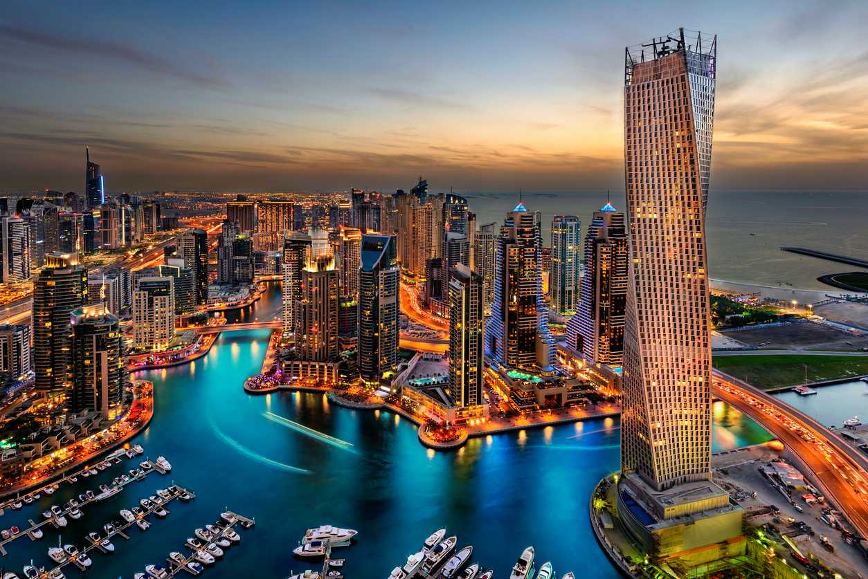 Dubai Marina from a high view showing the boats, sea, and the city scape