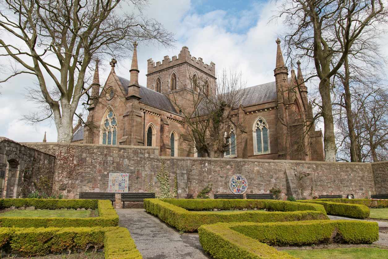 Saint Patrick's Church in Armagh City. Gardens and a wall in the foreground