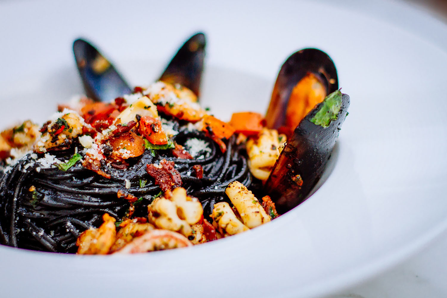 Squid ink pasta with seafood.
