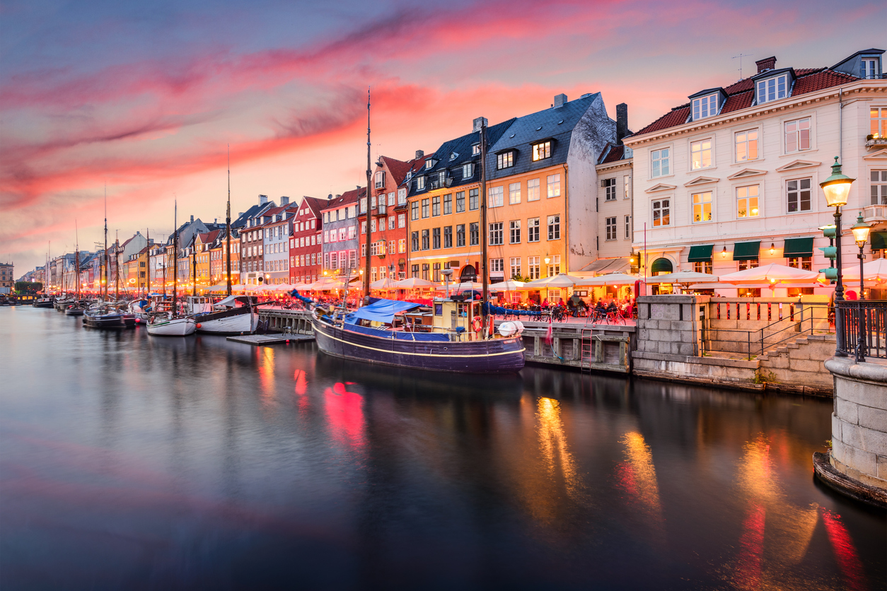 Copenhagen, Denmark on the Nyhavn Canal with cotton candy skies