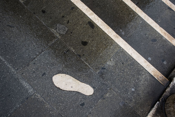 Marble footprint on the Ponte dei Pugni in Venice