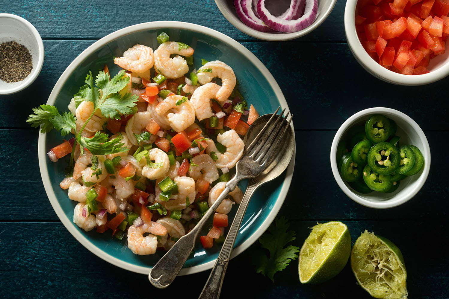 Shrimp ceviche with tomato, red onion, Jalapeño pepper, cilantro and lime.