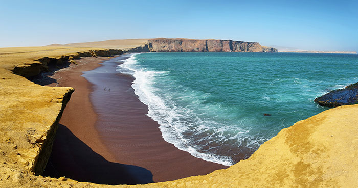 Waves crash upon the beach at Paracas National Reserve