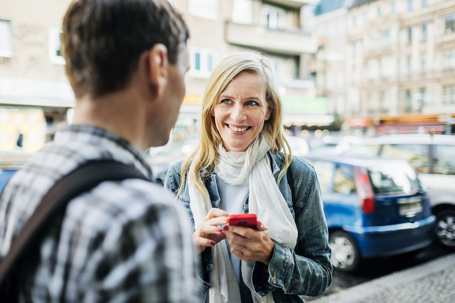 A traveling woman speaks with a local
