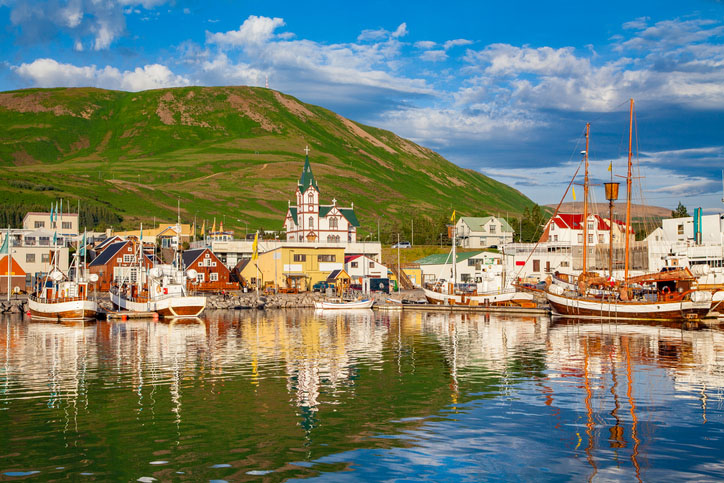 Town of Husavik, Iceland from the water at sunset