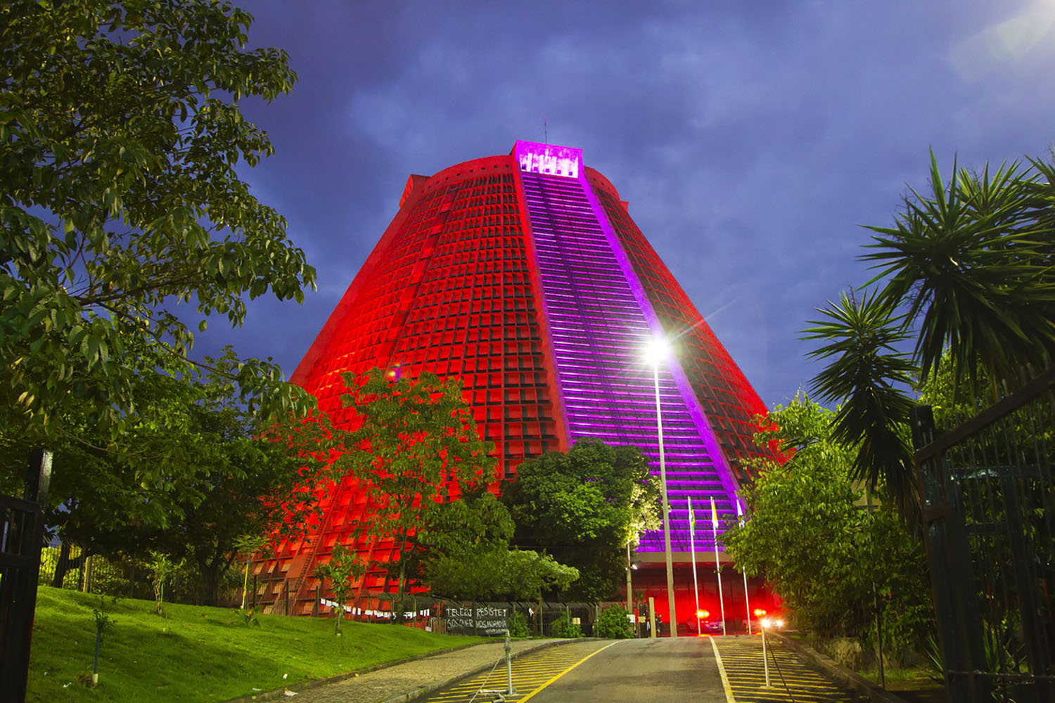 The Metropolitan Cathedral of Saint Sebastian in Rio de Janeiro colourfully illuminated in the evening