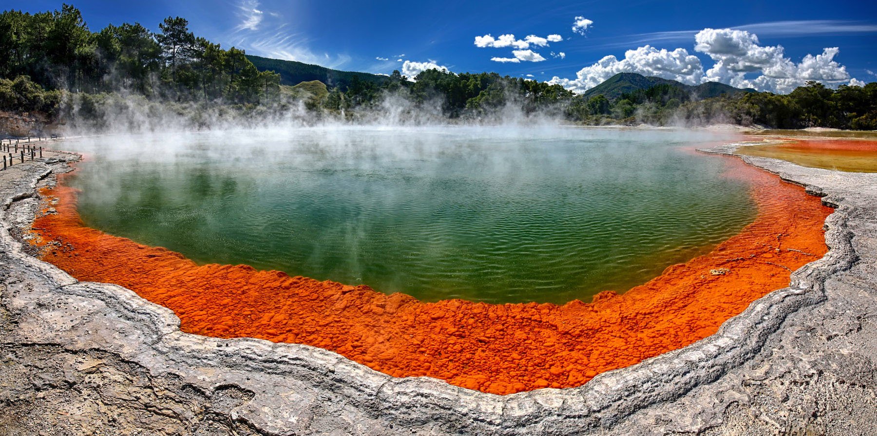Visit the famous Champagne Pool in Rotorua, New Zealand.