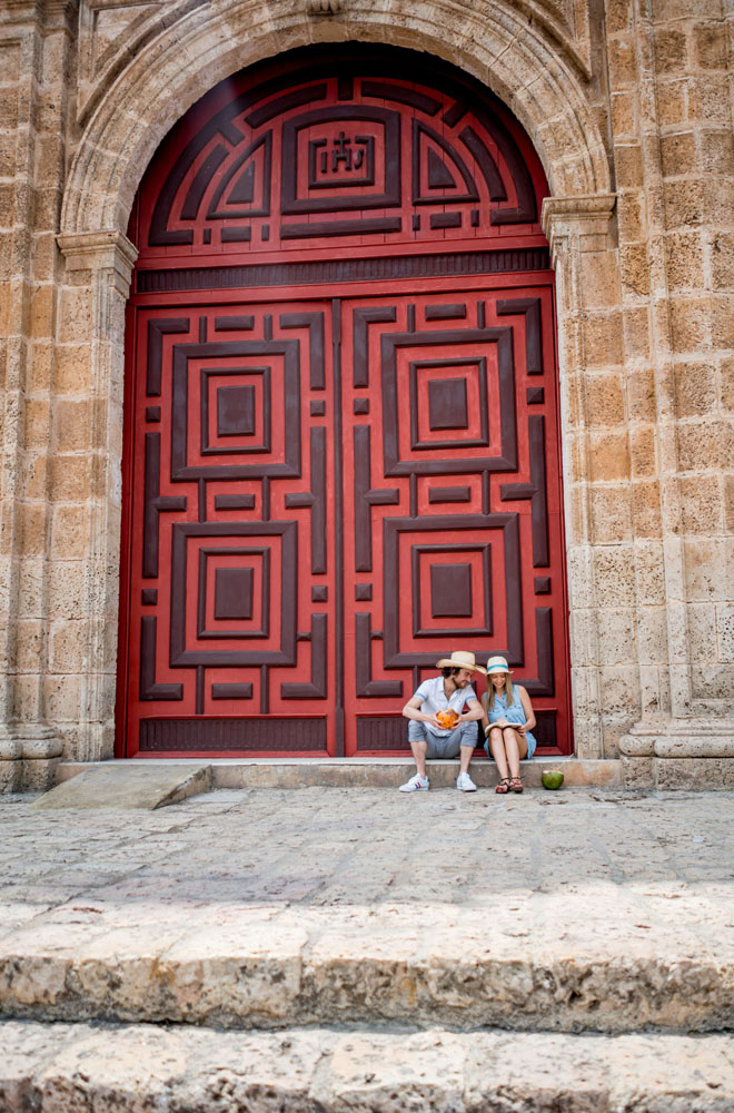 Ornate red entryway to the Iglesia de San Pedro Claver in Cartagena