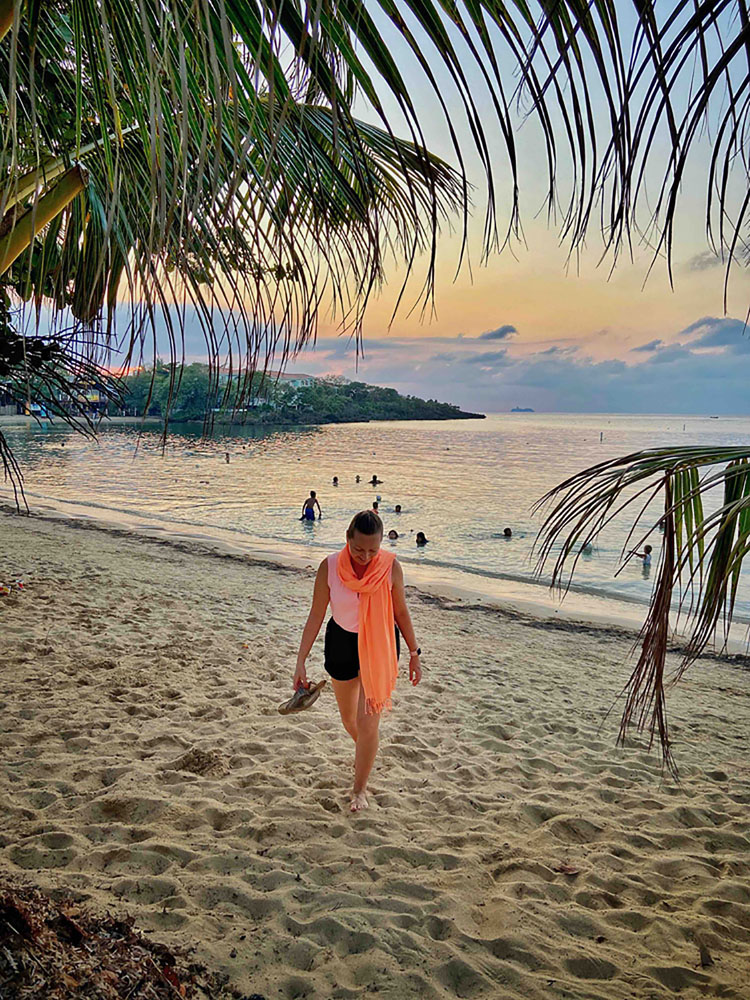 Tanya on the Roatan Beach at golden hour