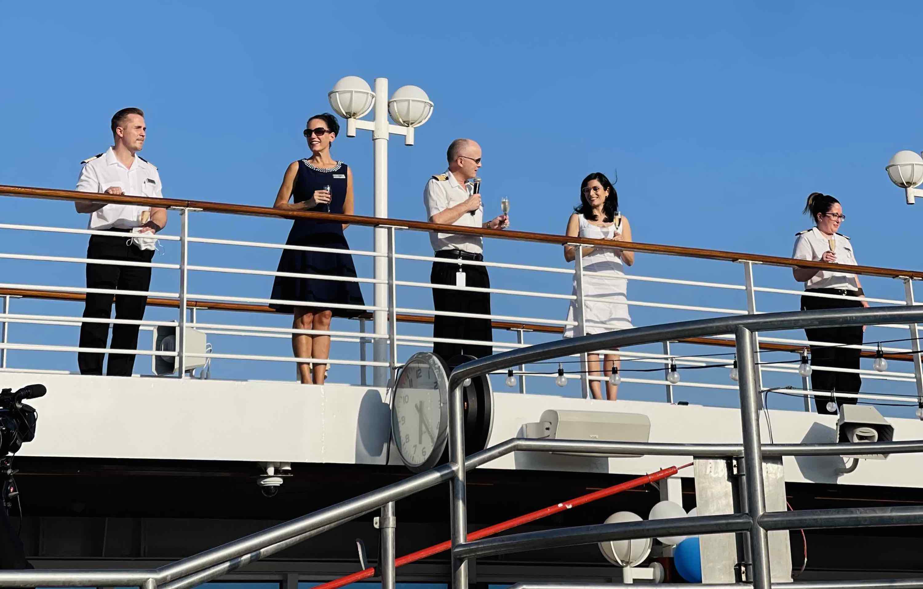 Azamara Quest crew toast before setting sail