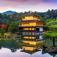 Pilot and female passenger in helicopter cockpit