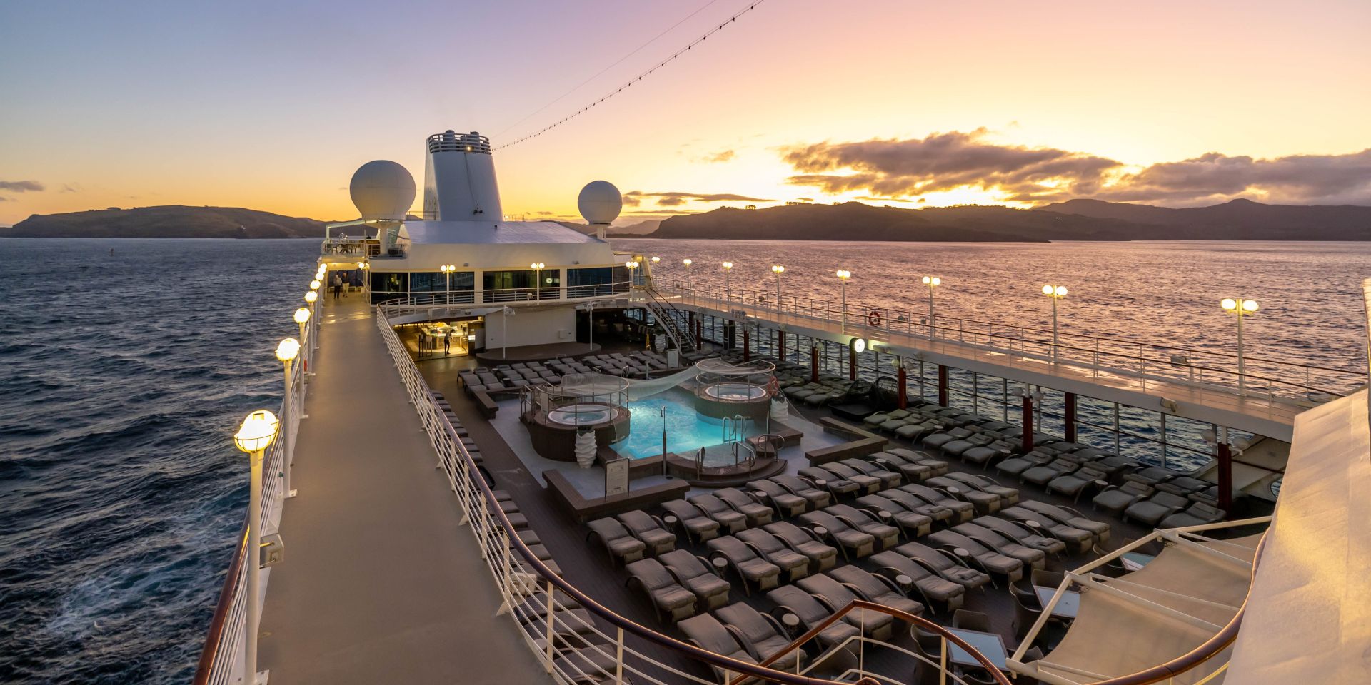 cruise ship sailing from port with beautiful sunset view!'carousel'